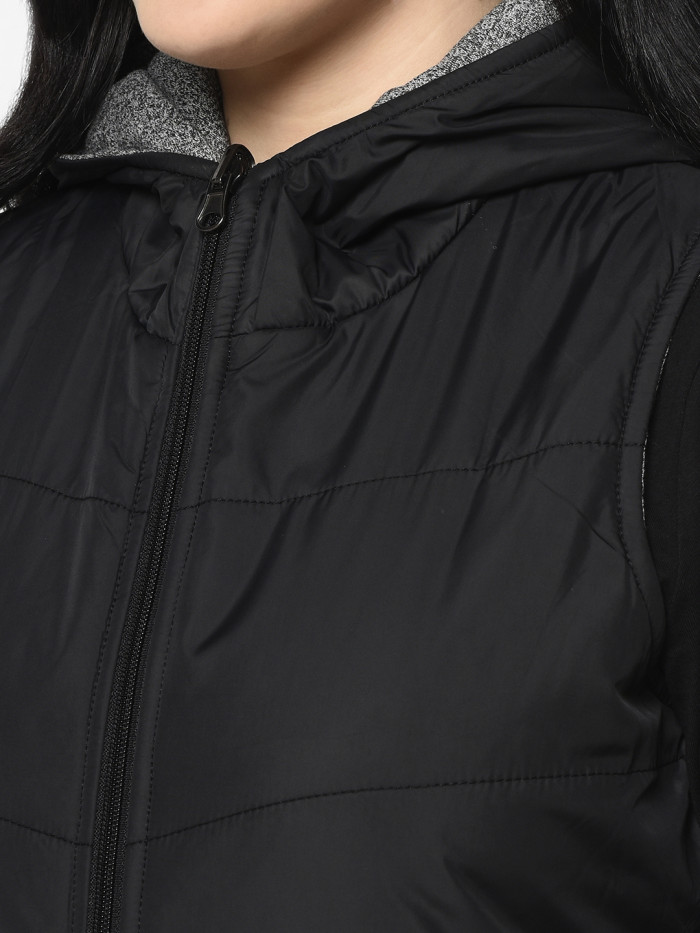 A model showcasing Women Reversible Half Jacket With Hood thumbnail.