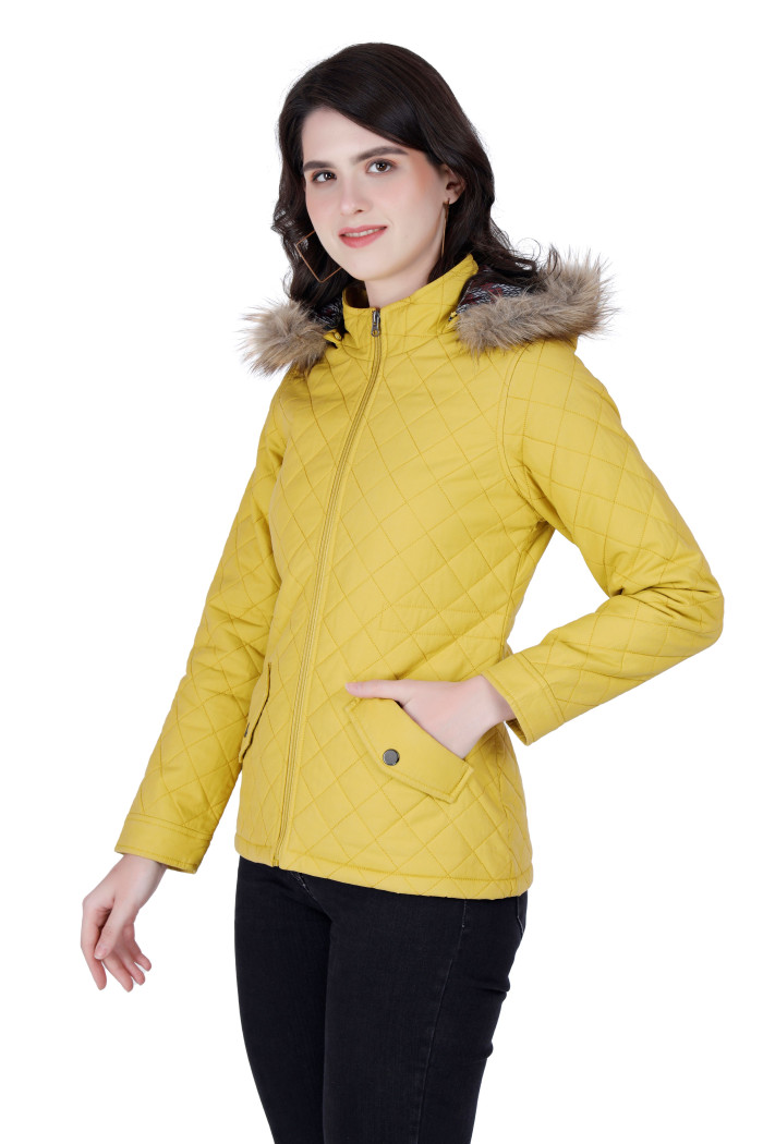 A right pose of a woman wearing a Mustard Quilted Jacket with a high neck, hood, zipper closure and side pocket designed for casual winter layering and comfort.