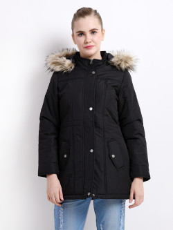 A cropped image of a woman wearing a Black Puffer jacket with a high neck, and matching hood designed for casual winter layering and comfort.