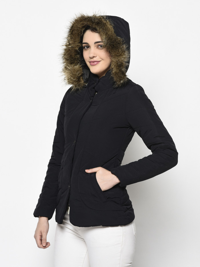 A right pose of a woman wearing a Black Quilted Jacket with a high neck, hood, zipper closure and side pocket designed for casual winter layering and comfort.