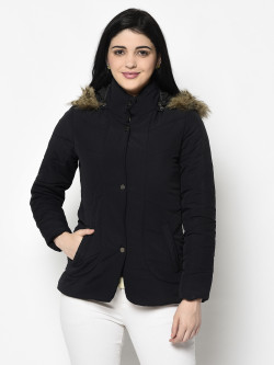 A cropped image of a woman wearing a Black Quilted Jacket with a high neck, and matching hood designed for casual winter layering and comfort.