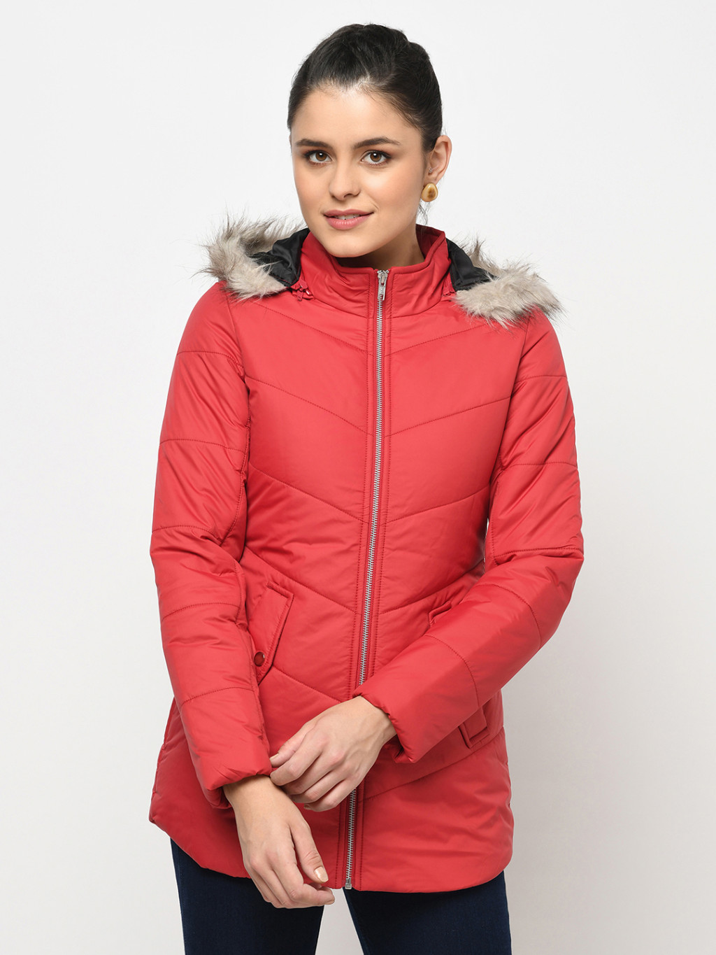 A woman wearing a Red Puffer jacket