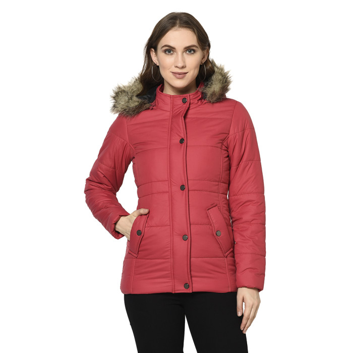 A cropped image of a woman wearing a Pink Puffer jacket with a high neck, and matching hood designed for casual winter layering and comfort.